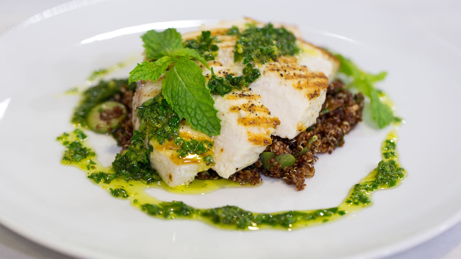 Grilled swordfish with Mediterranean quinoa salad