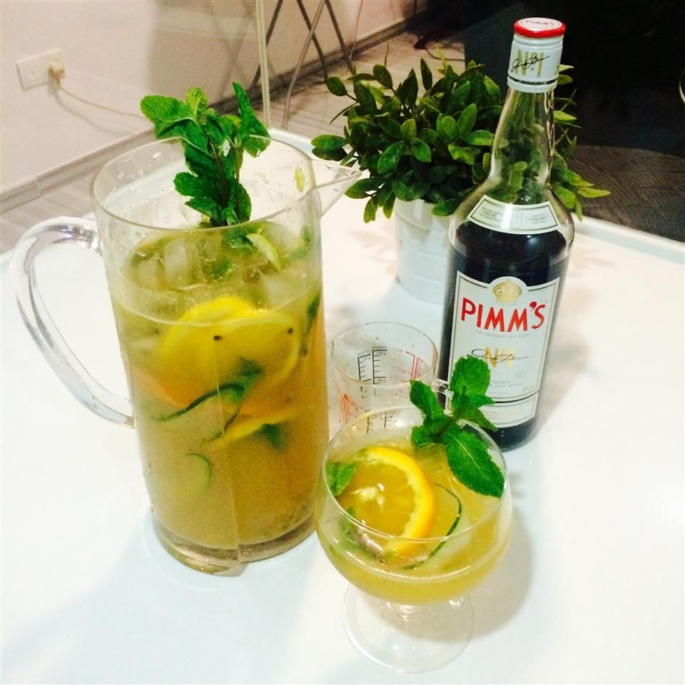 Pimm's Lemonade in a glass with garnishes