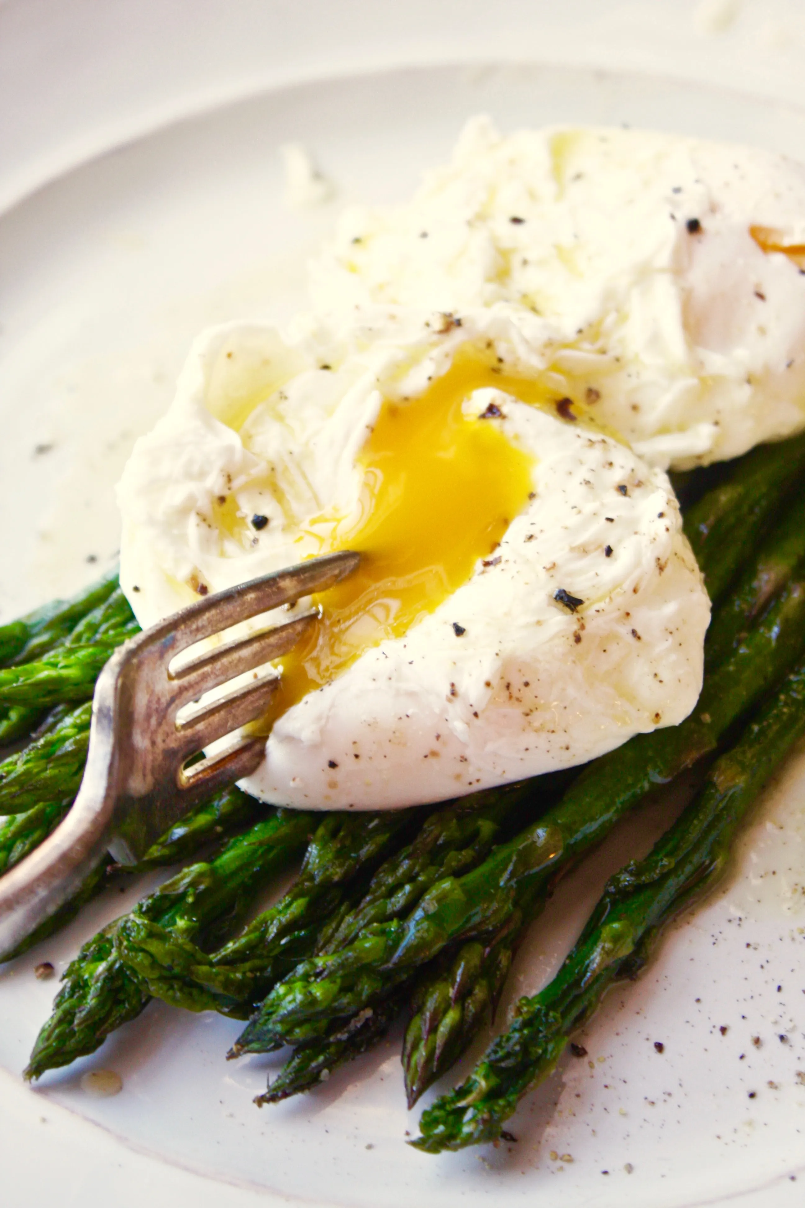 Poached Eggs over Roasted Asparagus with Lemon Vinaigrette