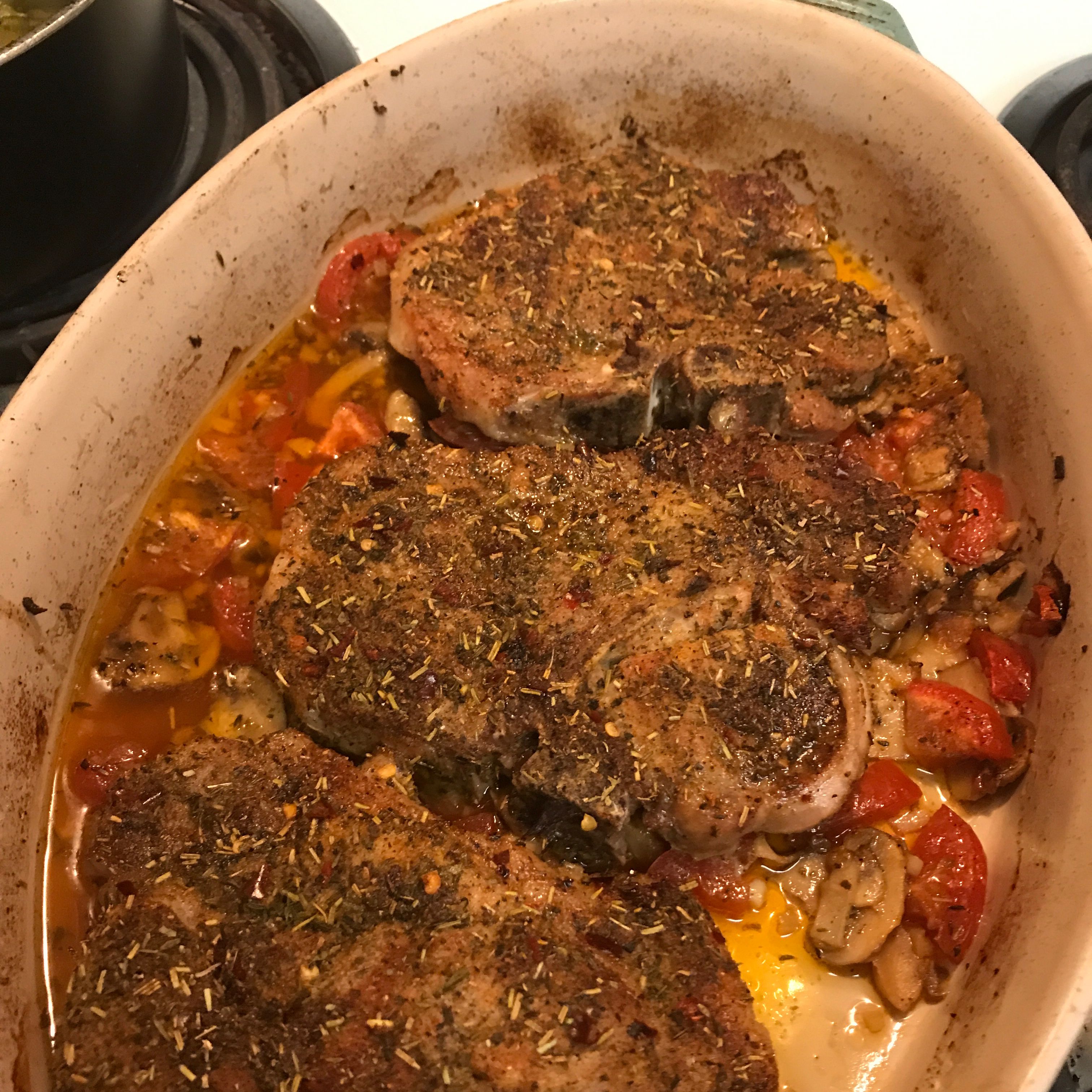 Roasted Pork Chops with Tomatoes, Mushrooms, and Garlic Sauce Spinach