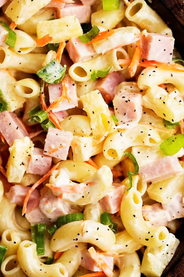 A delicious macaroni pasta salad with ham, pineapple, shredded carrots