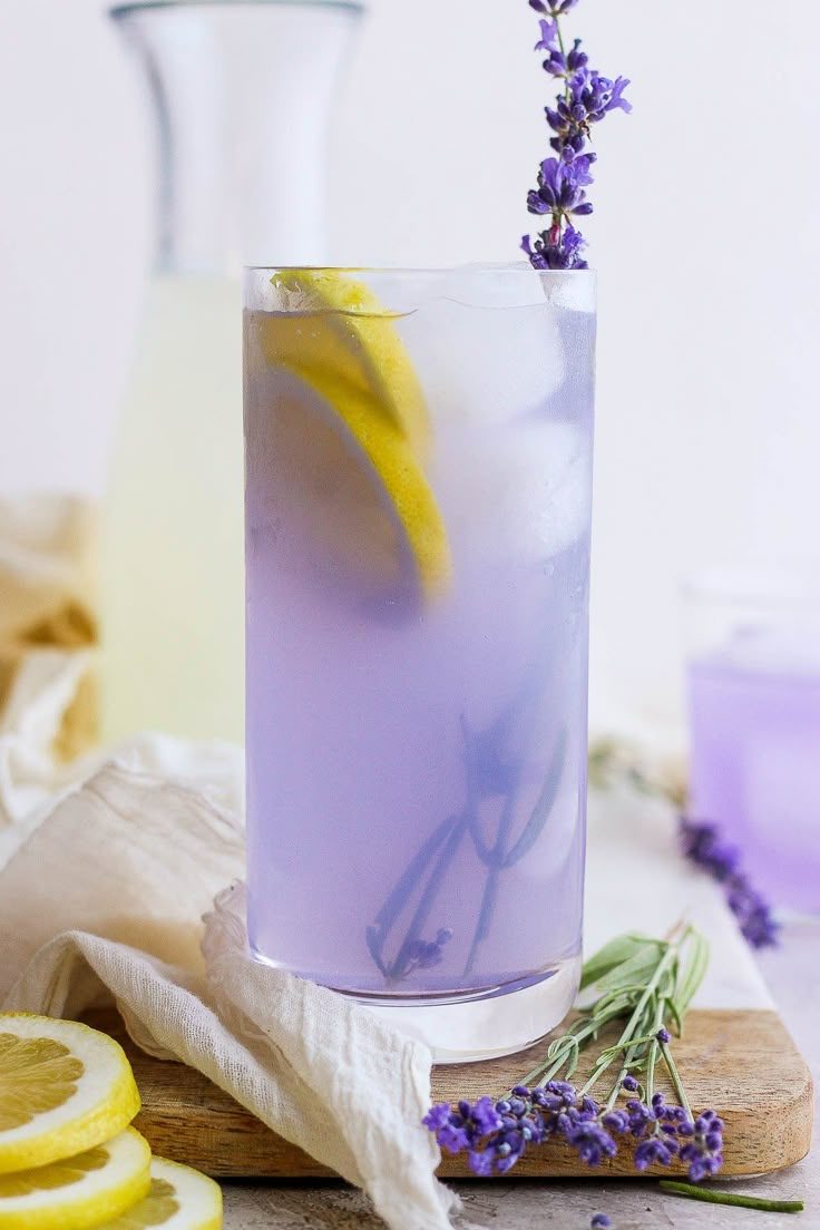 Lavender Lemonade in a glass with lavender sprigs