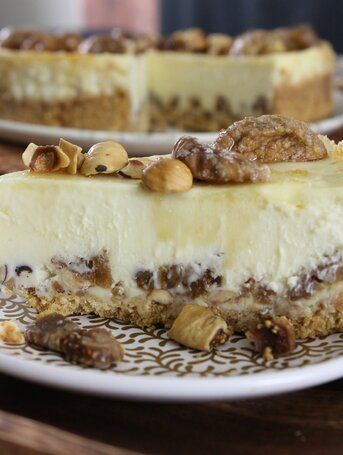 Fig-Hazelnut Cheesecake with Honey-Bourbon Drizzle