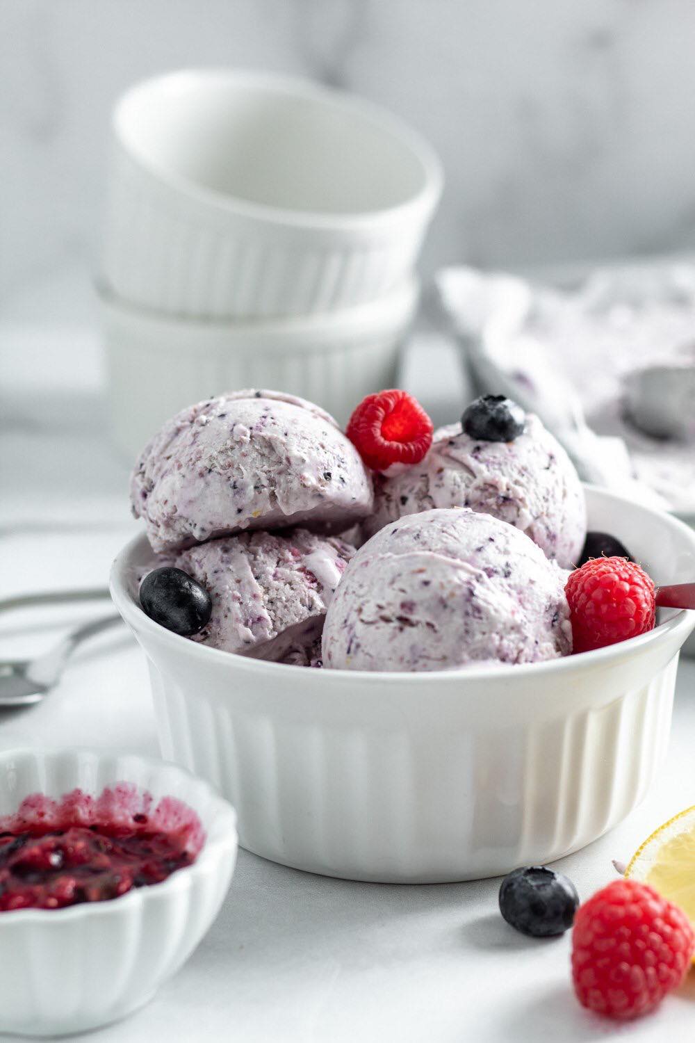 A bowl of Mixed Berry Mascarpone Ice Cream with berries