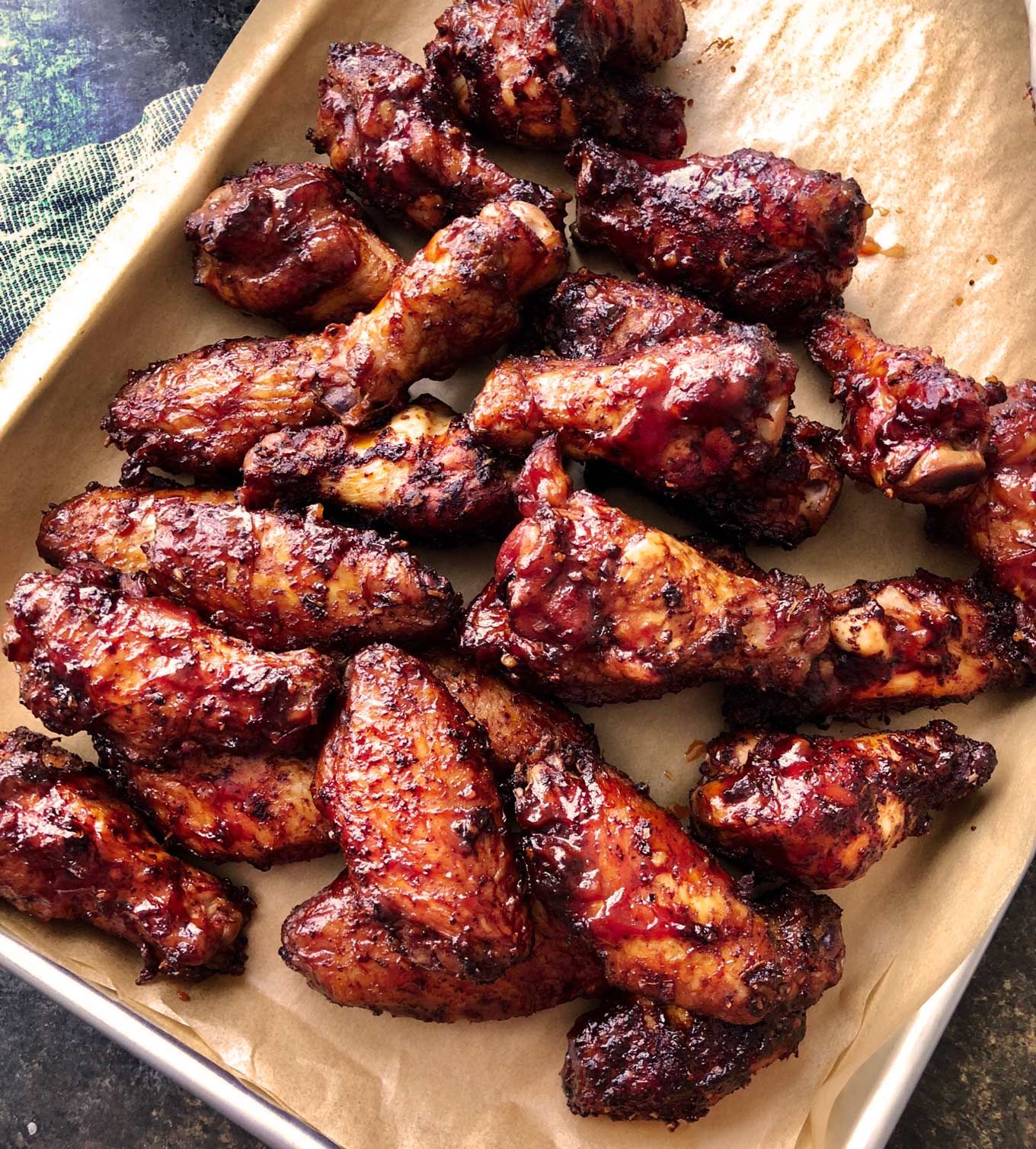 Insanely tasty chicken wing recipe, dry rubbed, then hickory smoked to perfection
