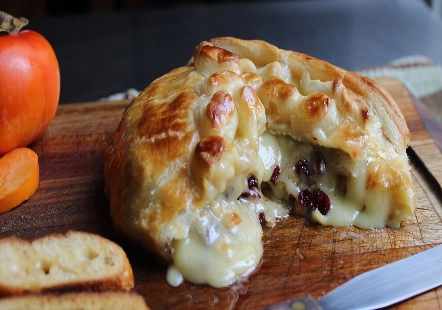 Baked Stuffed Brie with Cranberries & Walnuts