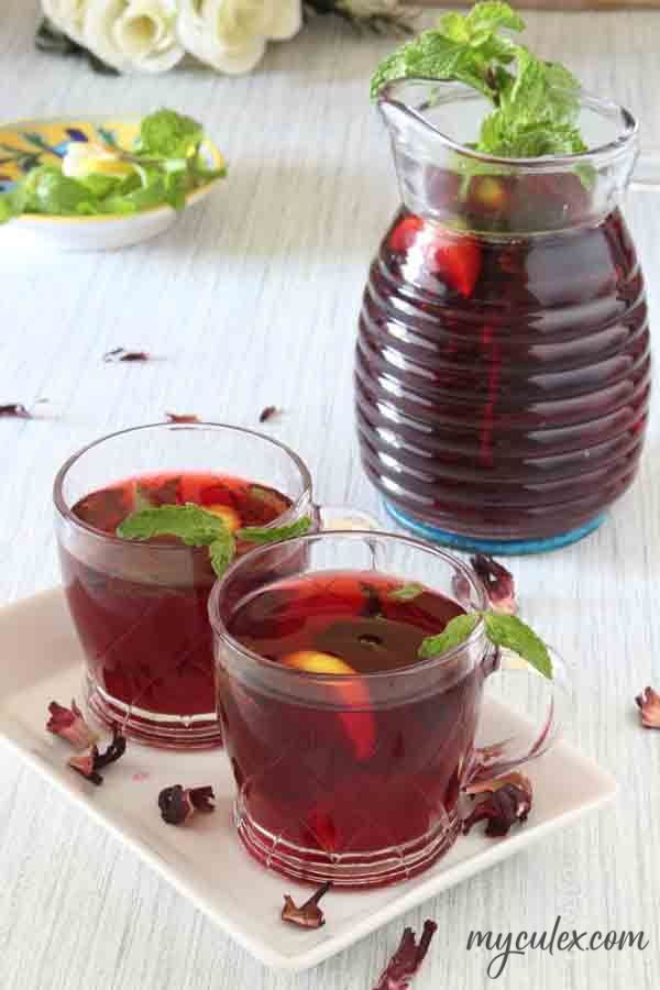 A glass of vibrant Egyptian Karkade - Hibiscus Iced Tea