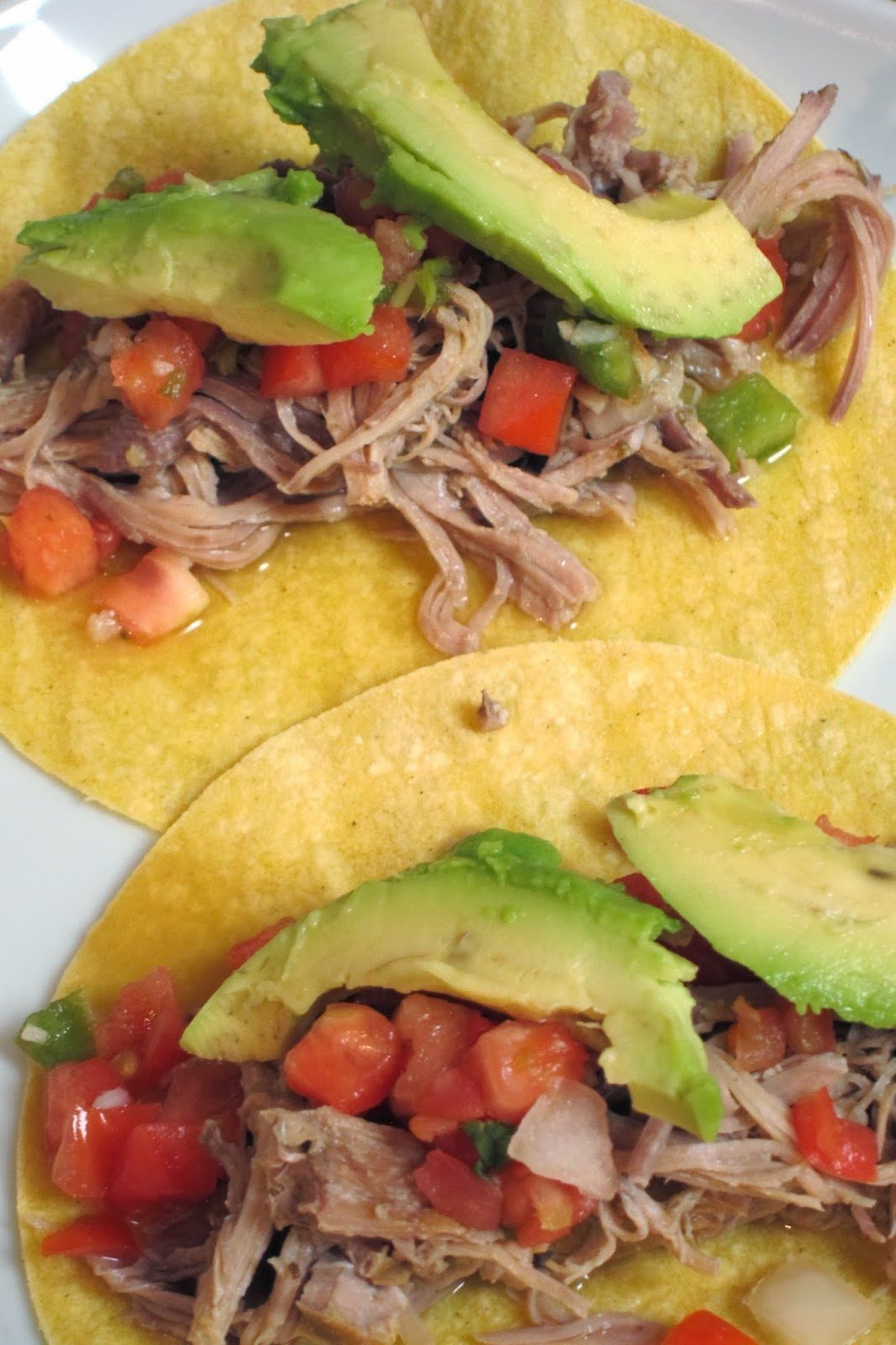Slow Cooker Puerto Rican Shredded Pork Tacos