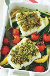 Citrus baked fish with courgettes