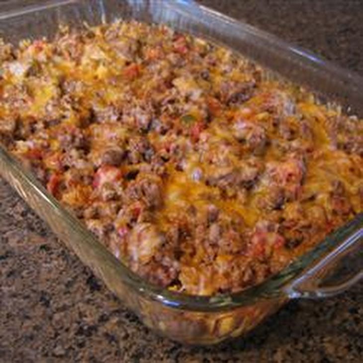 Taco Bake II Recipe - A delicious layered taco bake that will make your taste buds dance!